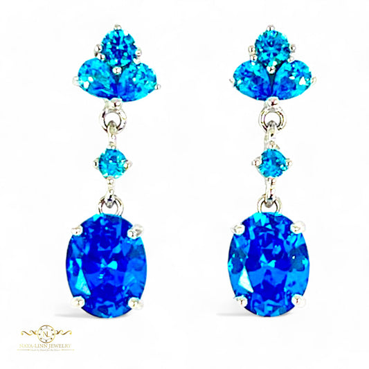 Claire Drop Earrings | Rhodium Over 925 Sterling Silver | Oval Cut Cubic Zirconia | Sapphire Blue