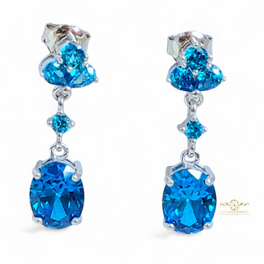 Claire Drop Earrings | Rhodium Over 925 Sterling Silver | Oval Cut Cubic Zirconia | Sapphire Blue