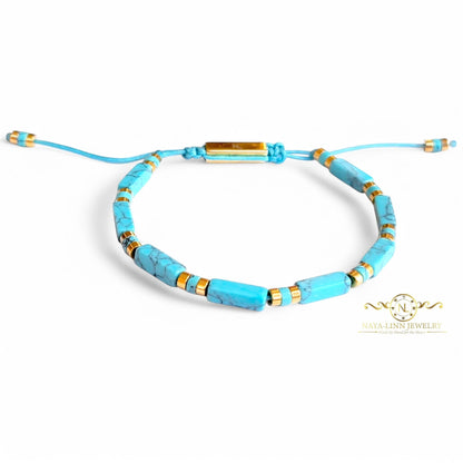Naya-Linn Jewelry minimalist men's bracelet with blue rectangular beads, gold-plated accents, and adjustable rope cord.