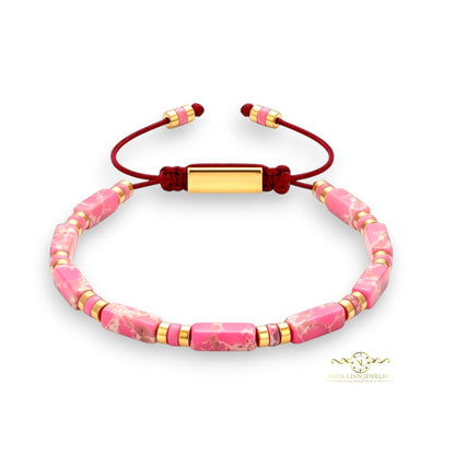 Naya-Linn Jewelry pink rectangular stone bead bracelet with 18K gold-plated accents and adjustable red rope cord.