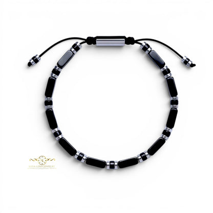 Naya-Linn Jewelry Xanthus men's bracelet with rectangular black beads, silver-tone accents, and adjustable rope cord.