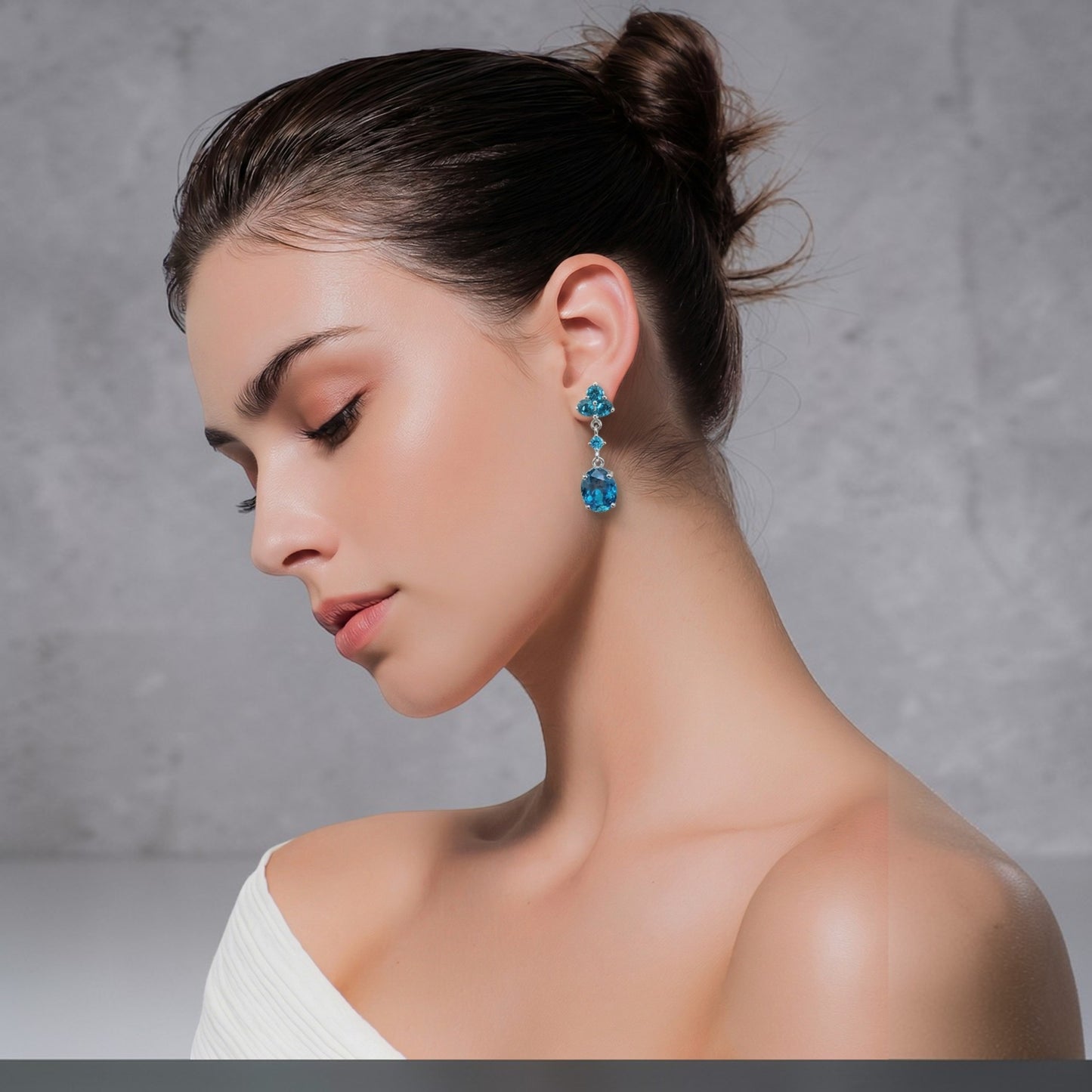 Claire Drop Earrings | Rhodium Over 925 Sterling Silver | Oval Cut Cubic Zirconia | Sapphire Blue