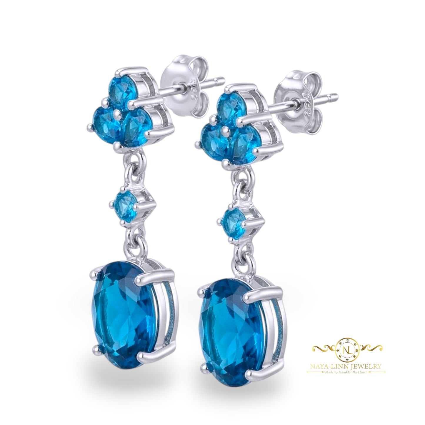 Claire Drop Earrings | Rhodium Over 925 Sterling Silver | Oval Cut Cubic Zirconia | Sapphire Blue